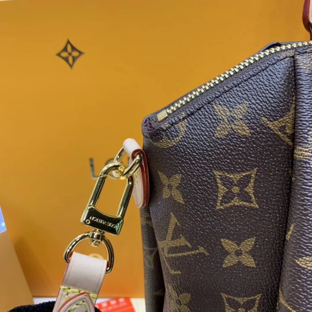Louis Vuitton Monogram Canvas Rivoli MM M44546