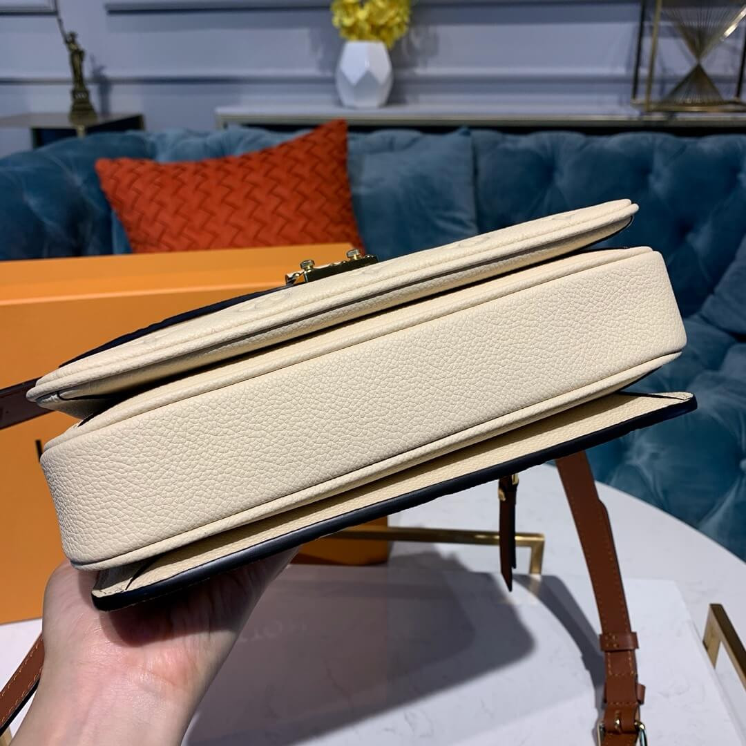 Louis Vuitton Monogram Empreinte Leather Pochette Métis M53940