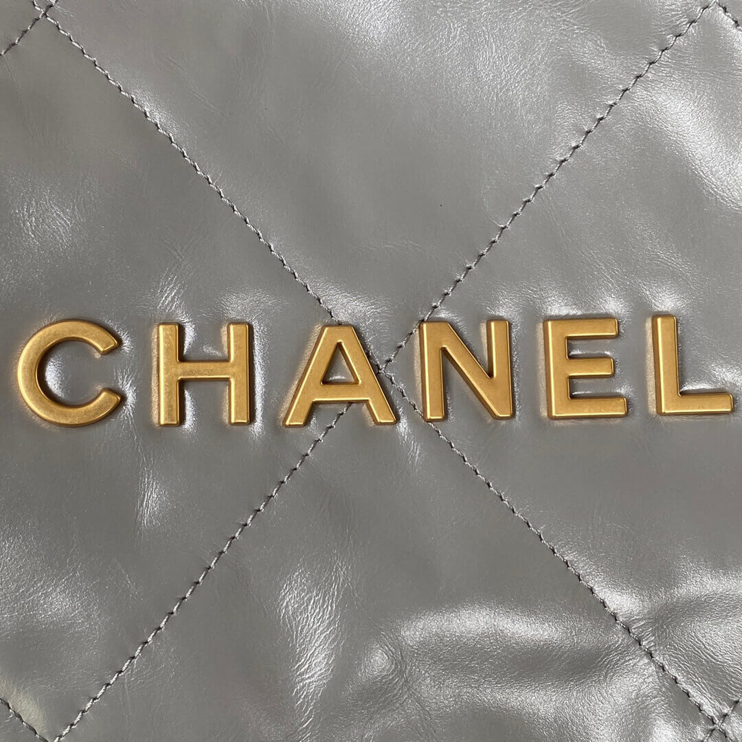 Chanel 22 Small Handbag Shiny Calfskin AS3260 Grey With logo Gold