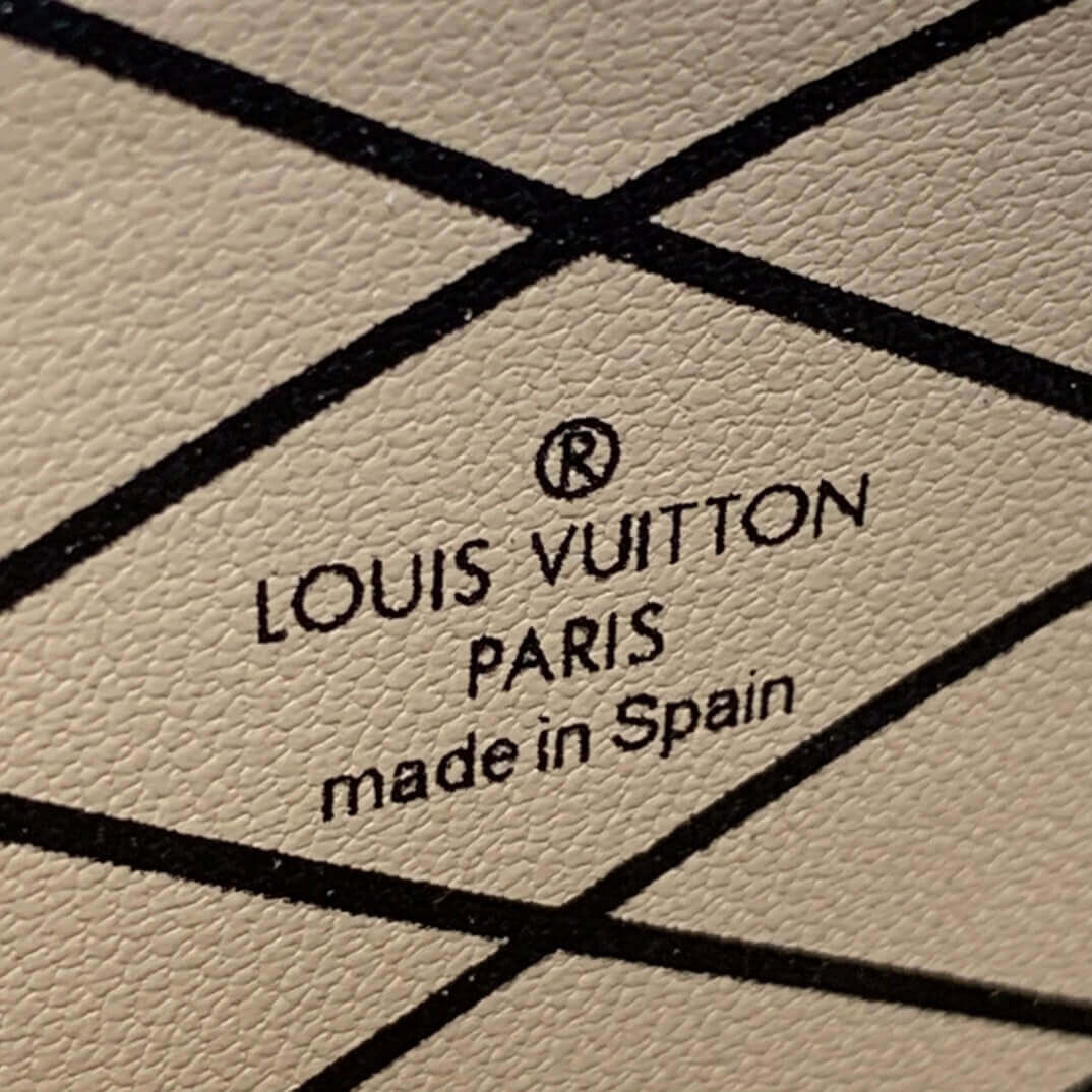 Louis Vuitton Vertical Trunk Pochette M67873