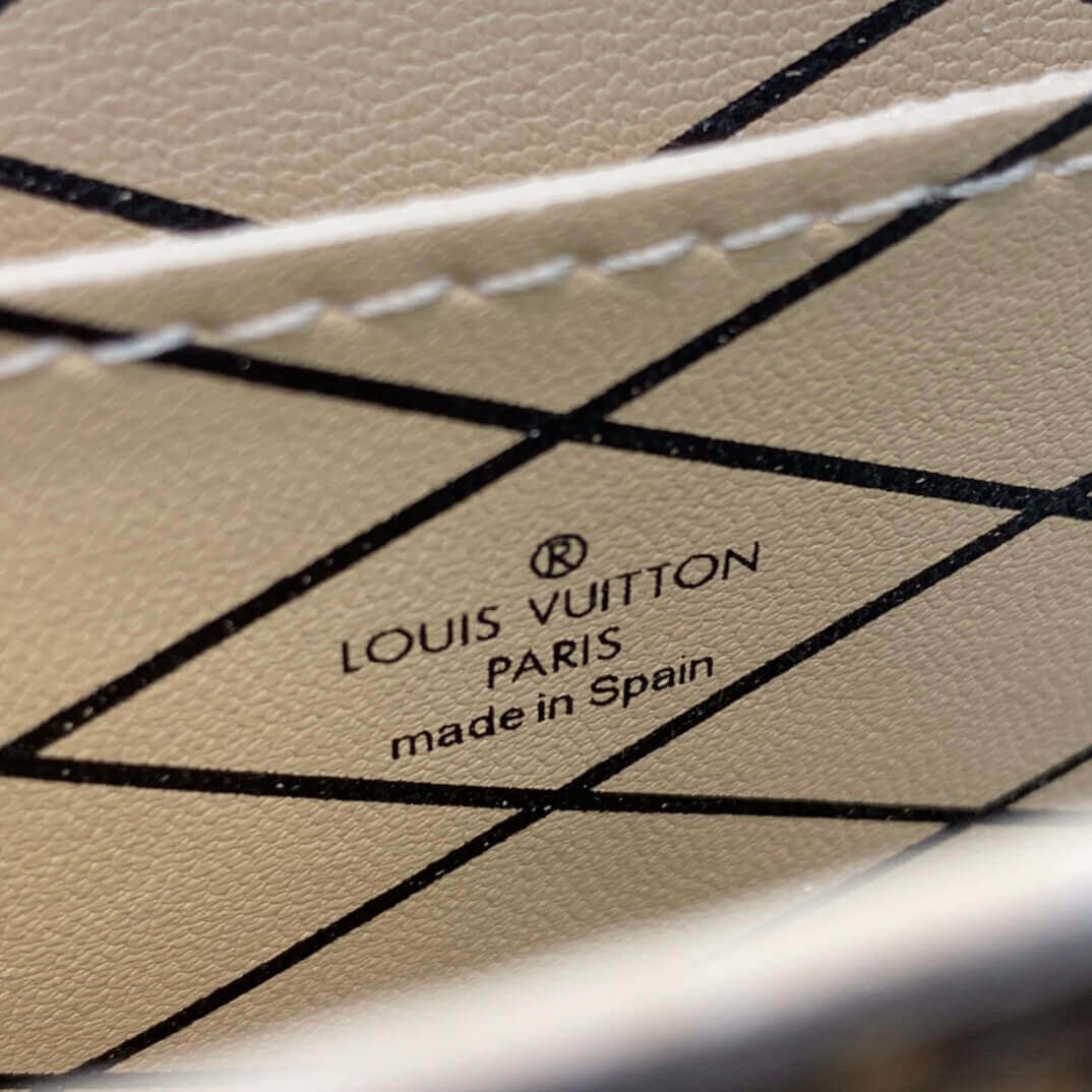 Louis Vuitton Vertical Trunk Pochette M63913