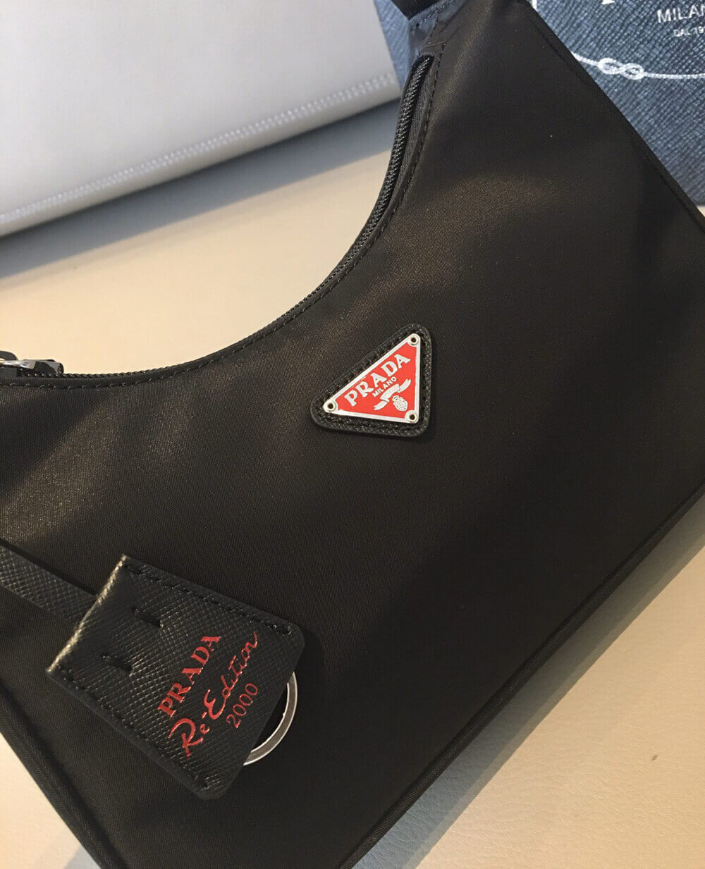 Prada Re-Edition 2000 Nylon Hobo Bag 1NE515 Black with Red Logo