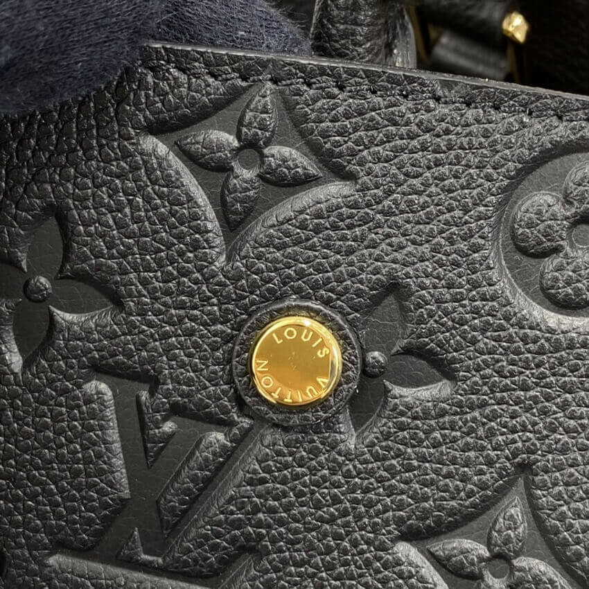 Louis Vuitton Monogram Empreinte Leather Montaigne MM M41048