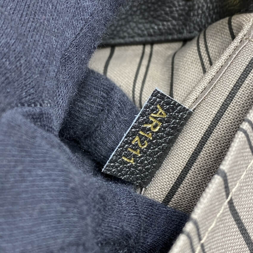 Louis Vuitton Monogram Empreinte Leather Montaigne MM M41048