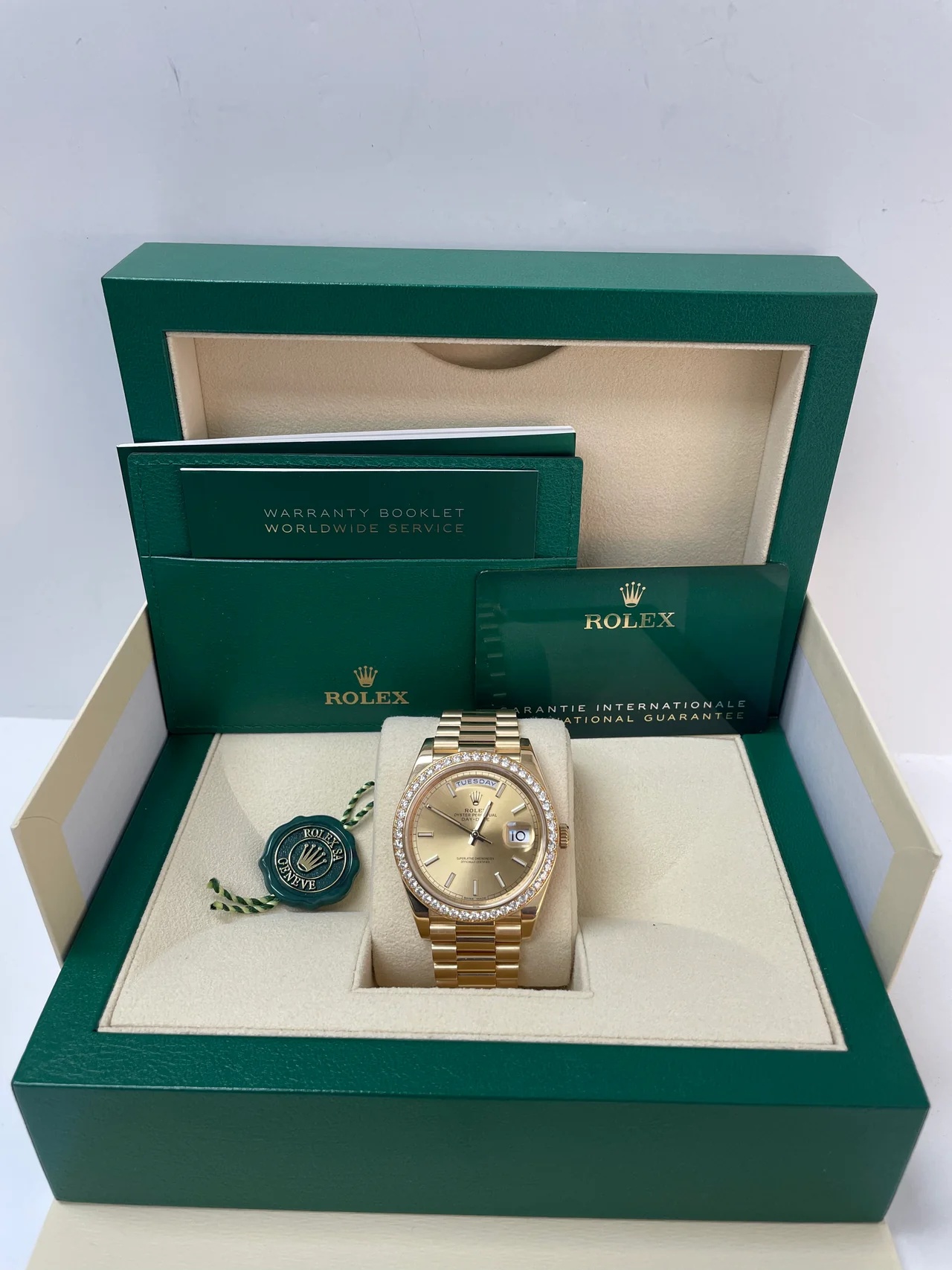 Rolex Day-Date 40mm Champaign Dial and Diamond Bezel Yellow Gold President Bracelet 228348RBR-0008