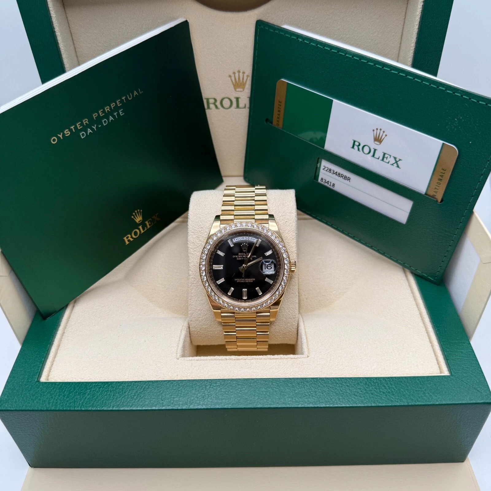 Rolex Day-Date 40mm Black Diamond Dial and Diamond Bezel Yellow Gold President Bracelet  228348RBR-0001