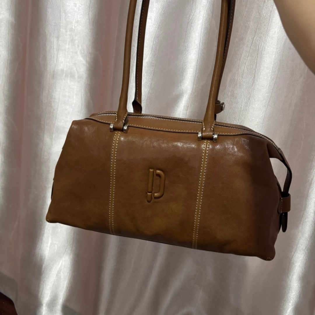 Clown bowling bag, tanned leather, oil wax, long handle, hand-held armpit bag, baguette, super popular Boston bag