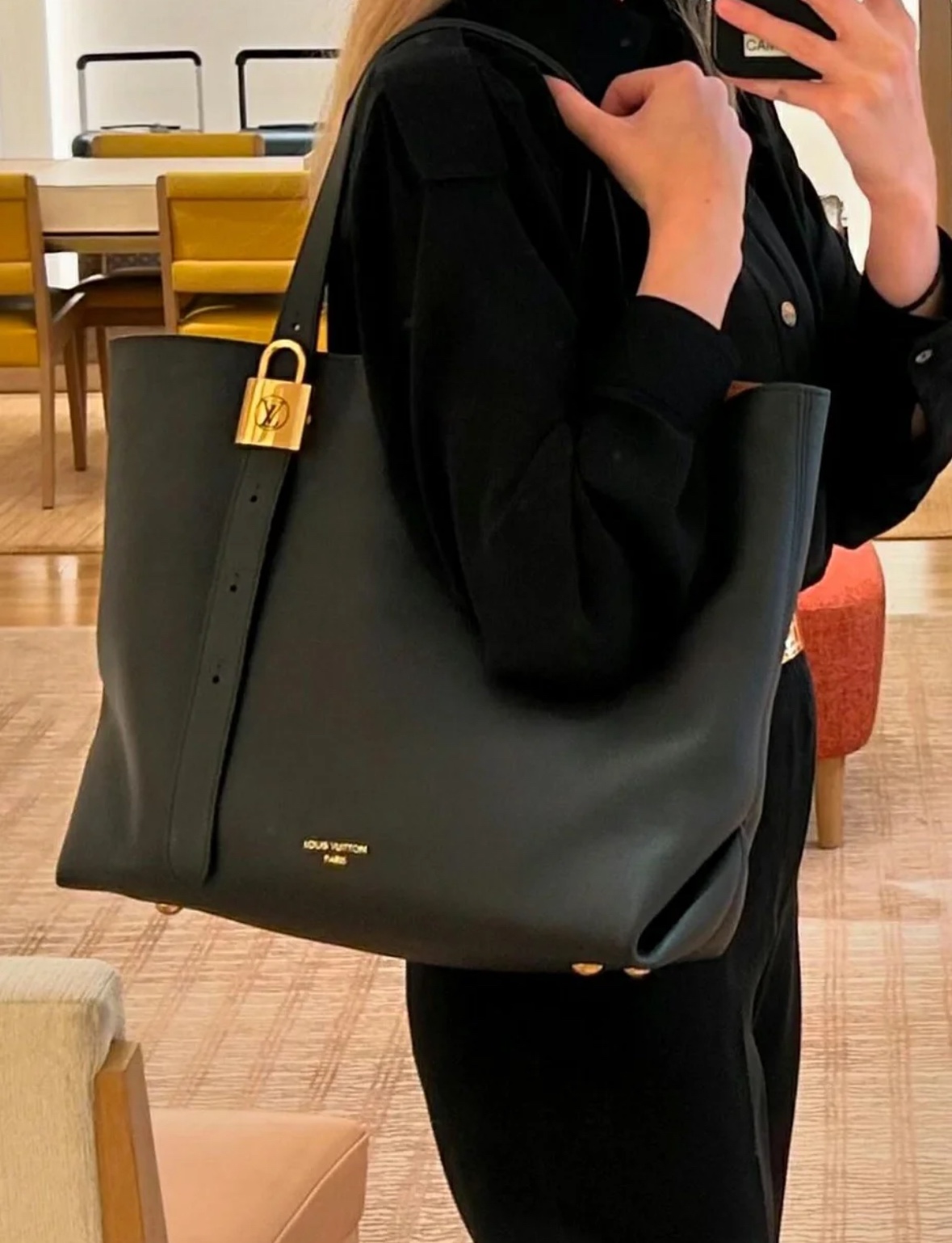 Medium sized handbag wrapped in soft grain cowhide leather with suede leather lining