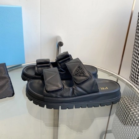 PRADA WOMEN’S SANDALS IN BLACK PADDED NAPPA LEATHER – PSD023