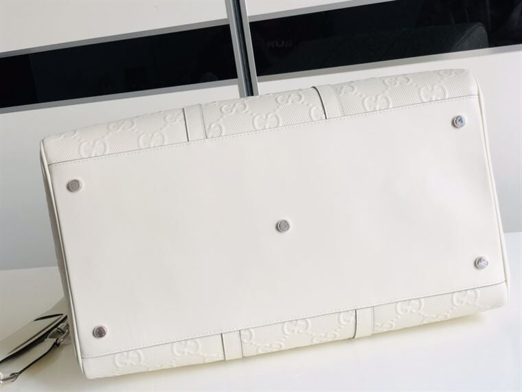 GUCCI GG EMBOSSED DUFFLE BAG – BG015