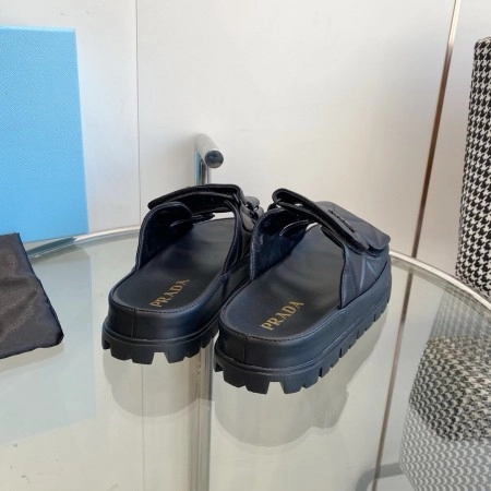PRADA WOMEN’S SANDALS IN BLACK PADDED NAPPA LEATHER – PSD023