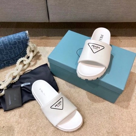 PRADA WHITE LEATHER SLIDES WITH PRINTED TRIANGLE LOGO – PSD089