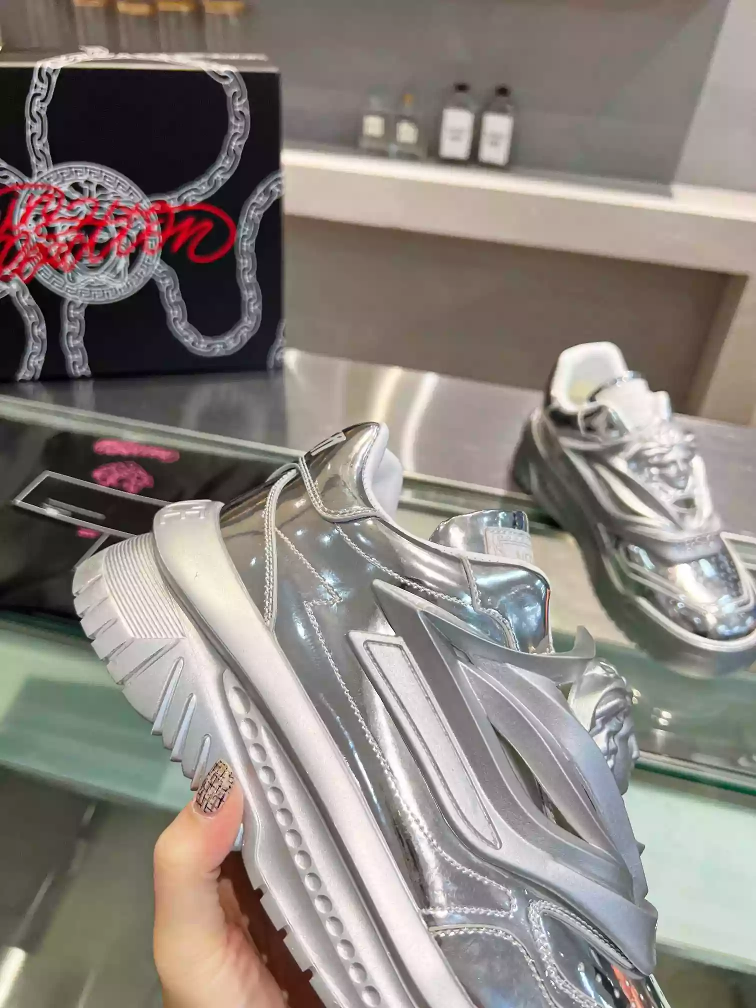 VERSACE WOMEN’S ODISSEA SNEAKERS IN SILVER LEATHER – VSS019