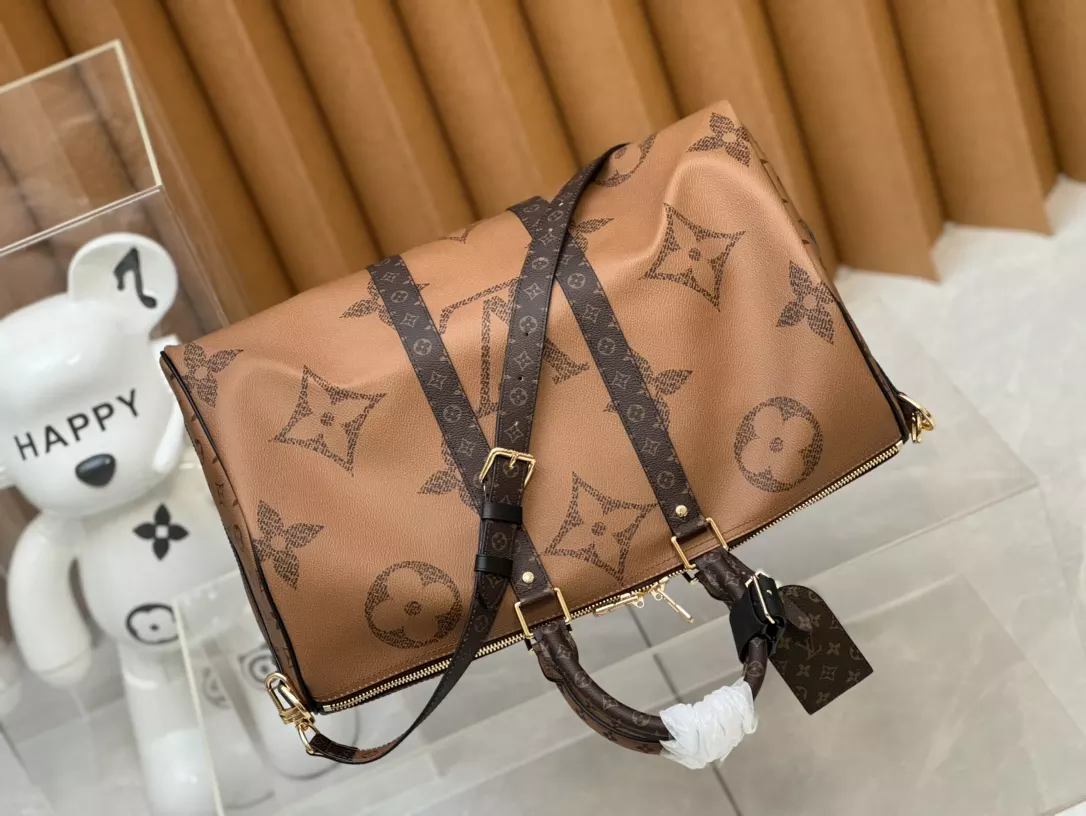 Louis Vuitton Keepall Bandoulière 45 in Monogram Giant Canvas – LW191