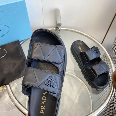 PRADA WOMEN’S SANDALS IN BLACK PADDED NAPPA LEATHER – PSD023