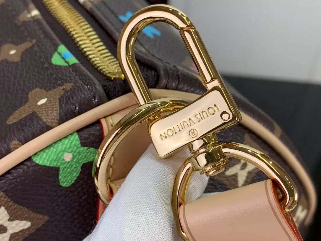 LV Keepall Bandoulière 50 Bag in Chocolate Monogram Craggy Coated Canvas – LW176