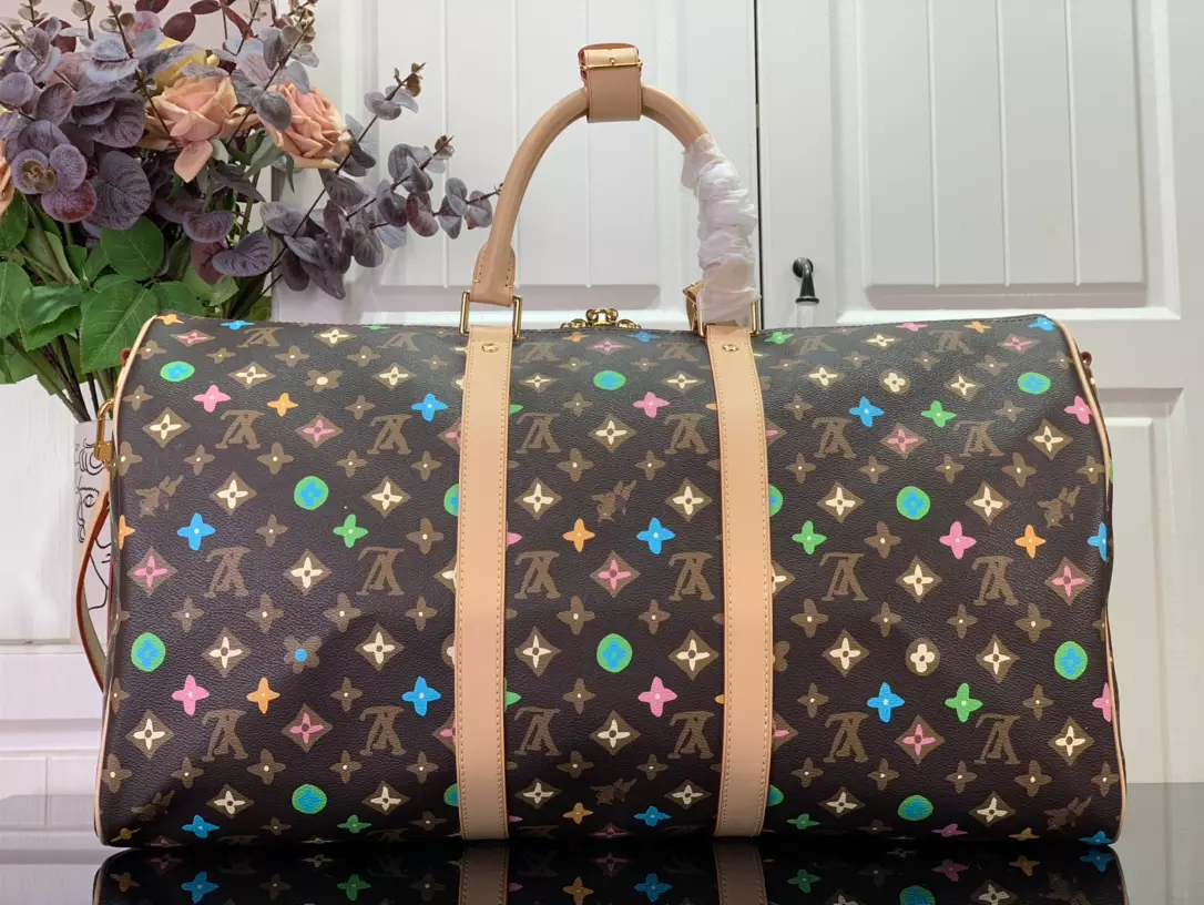 LV Keepall Bandoulière 50 Bag in Chocolate Monogram Craggy Coated Canvas – LW176