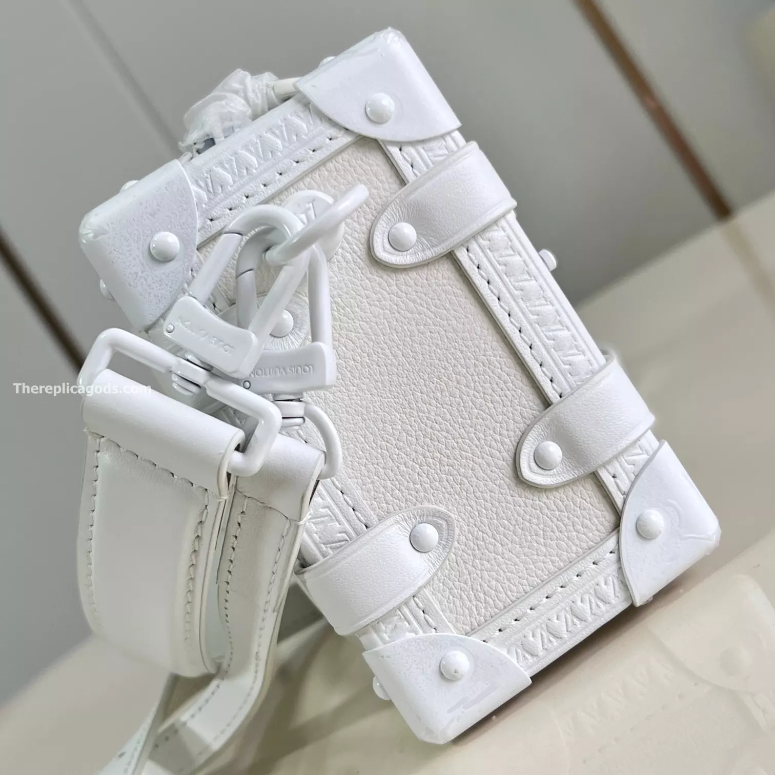 SIDE TRUNK PM BAG OPTICAL WHITE COWHIDE LEATHER M24304 – LW425