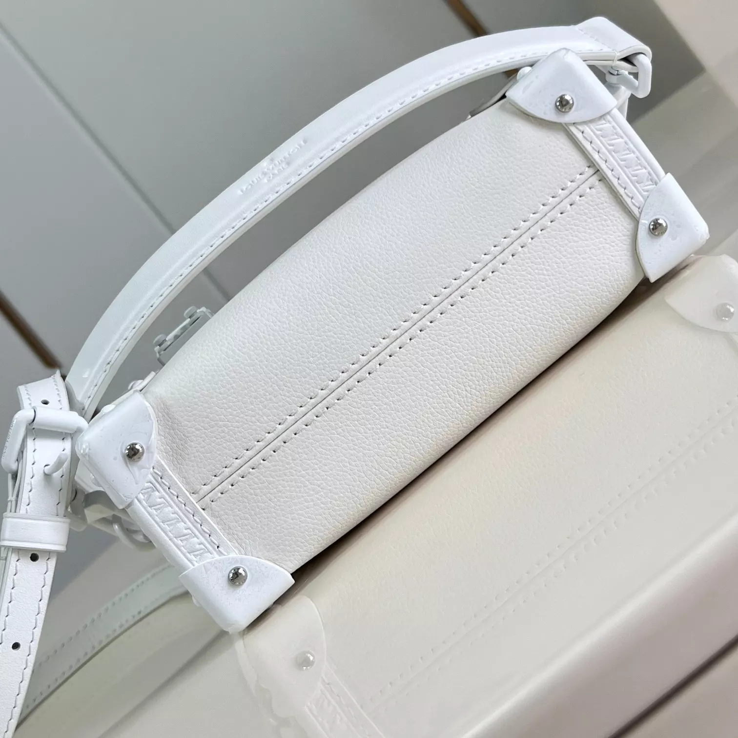 SIDE TRUNK PM BAG OPTICAL WHITE COWHIDE LEATHER M24304 – LW425