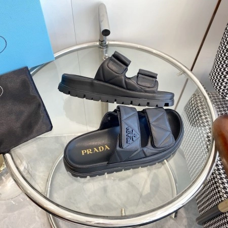 PRADA WOMEN’S SANDALS IN BLACK PADDED NAPPA LEATHER – PSD023