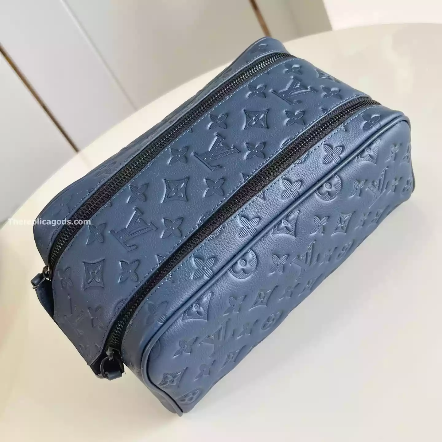 DOPP KIT NAVY BLUE MONOGRAM SHADOW – LW303