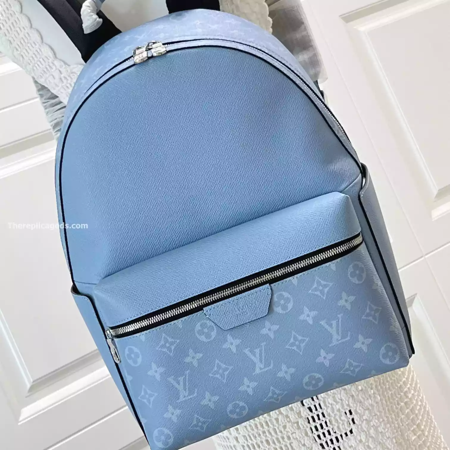 DISCOVERY BACKPACK PM SKY BLUE MONOGRAM CANVAS – LW321