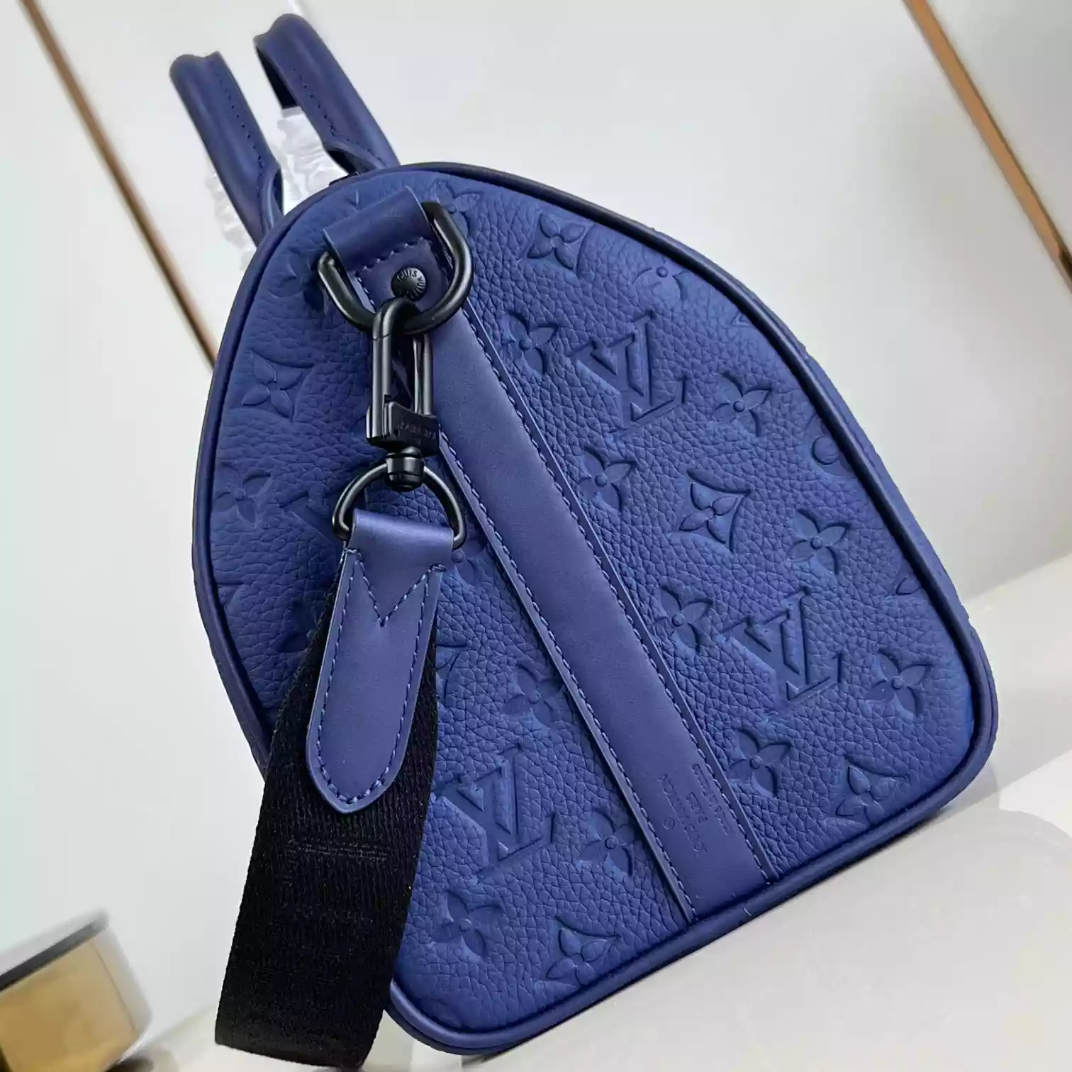 KEEPALL BANDOULIERE 35 BLUE MONOGRAM TAURILLON LEATHER M11691 – LW434