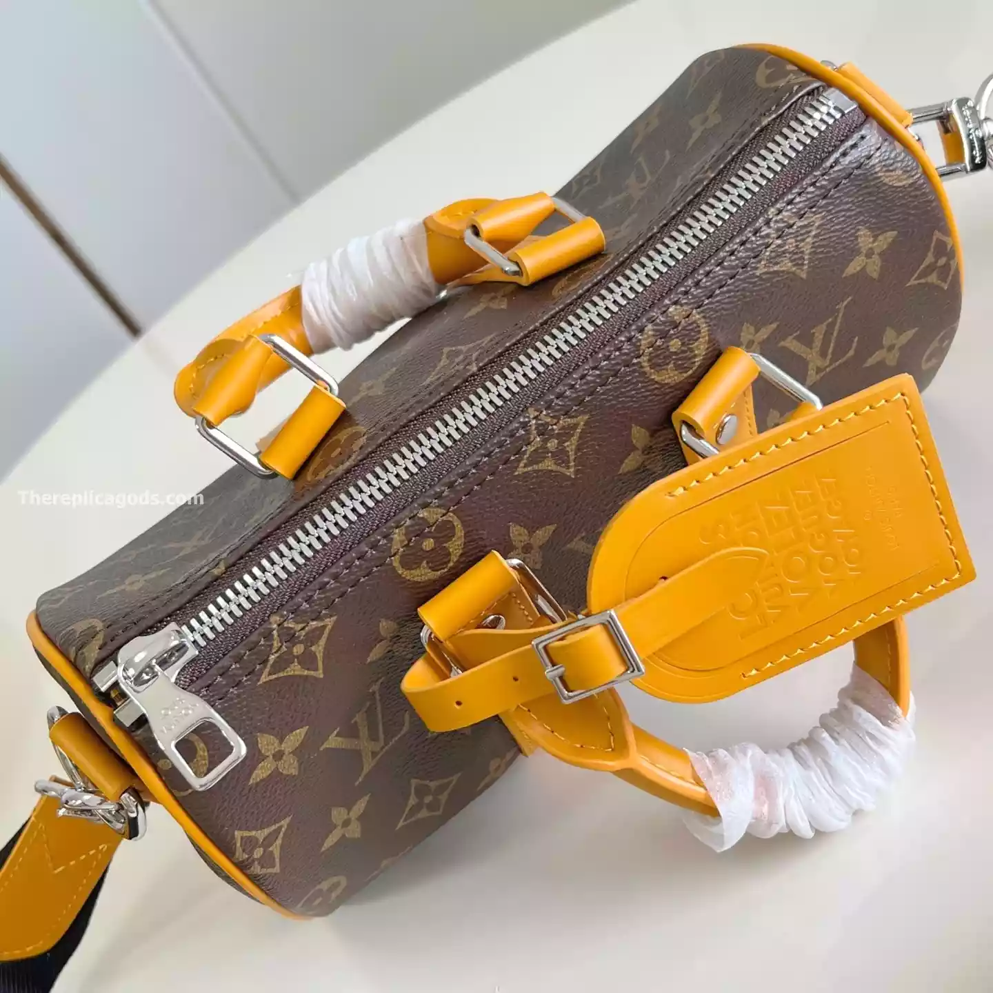 KEEPALL BANDOULIERE 25 BAG SAFRAN YELLOW MONOGRAM MACASSAR – LW301