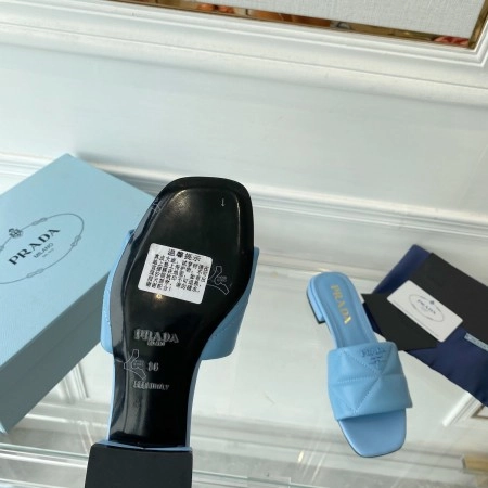 PRADA WOMEN’S SLIDES SANDALS IN LIGHT BLUE NAPPA LEATHER – PSD075