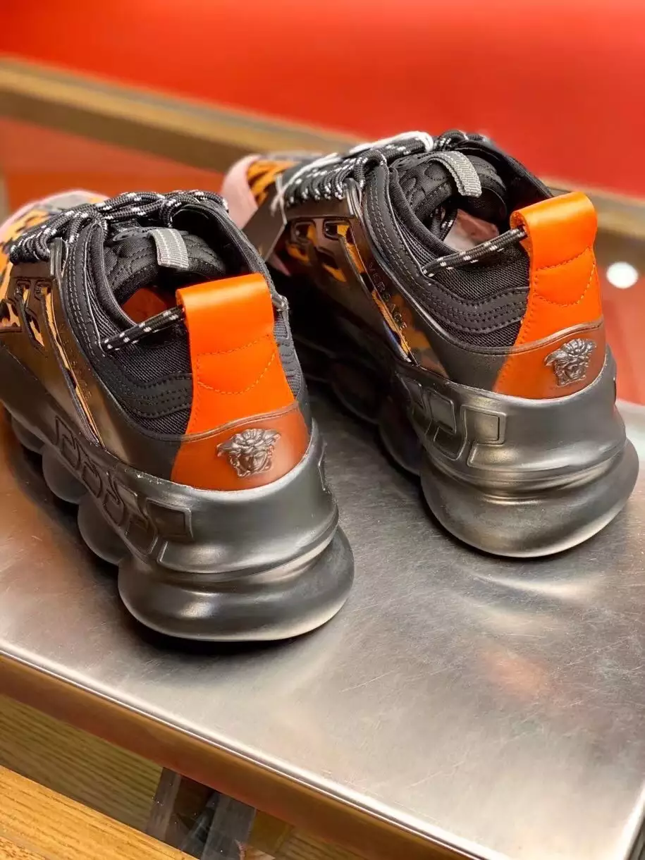 VERSACE WOMEN’S BLACK CHAIN REACTION SNEAKERS WITH LEOPARD PRINT – VSS027