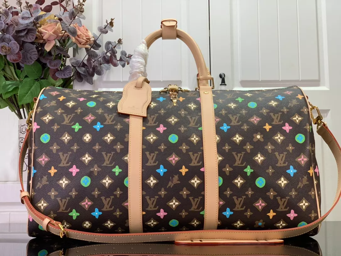 LV Keepall Bandoulière 50 Bag in Chocolate Monogram Craggy Coated Canvas – LW176