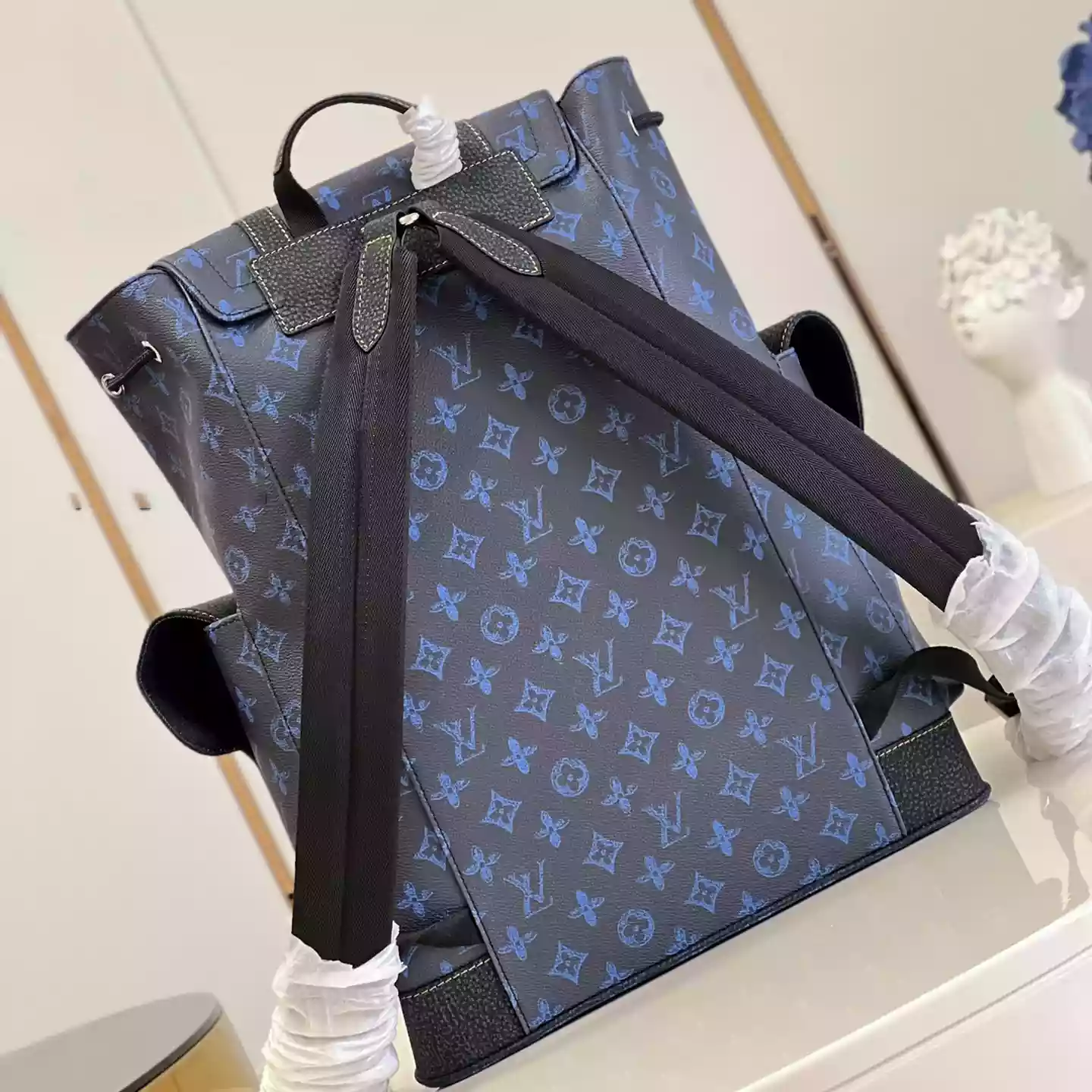 CHRISTOPHER MM MONOGRAM BACKPACK IN BLUE – LW345