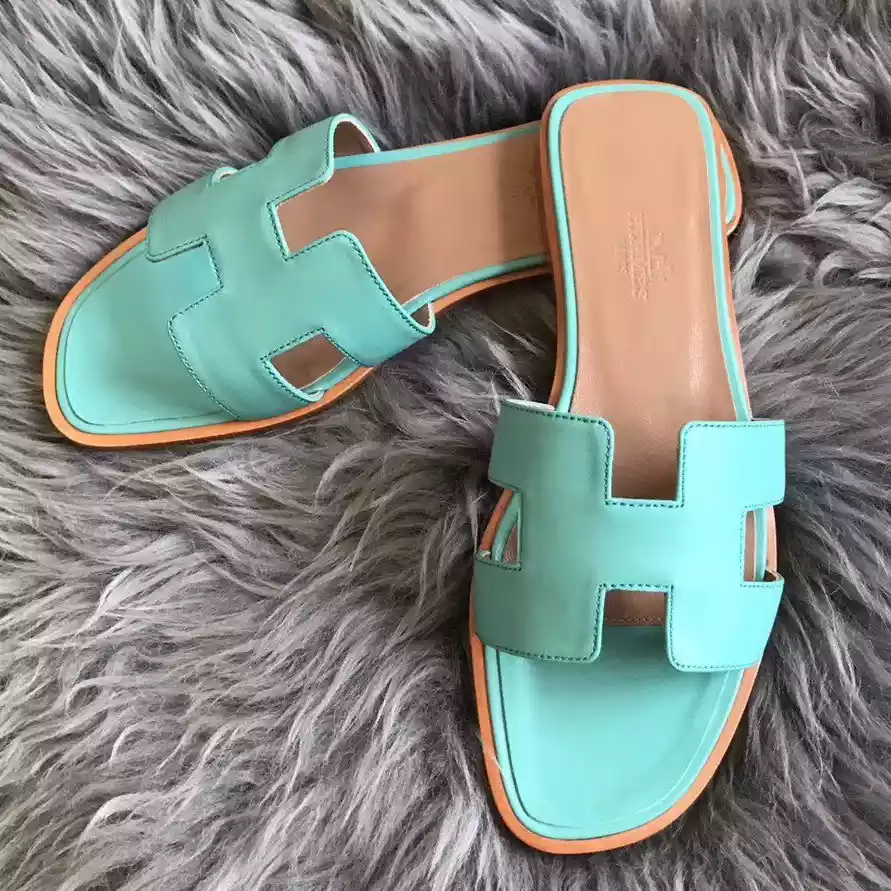HERMES ORAN SLIDE SANDALS IN BLUE ATOLL SWIFT CALFSKIN – HMSD123