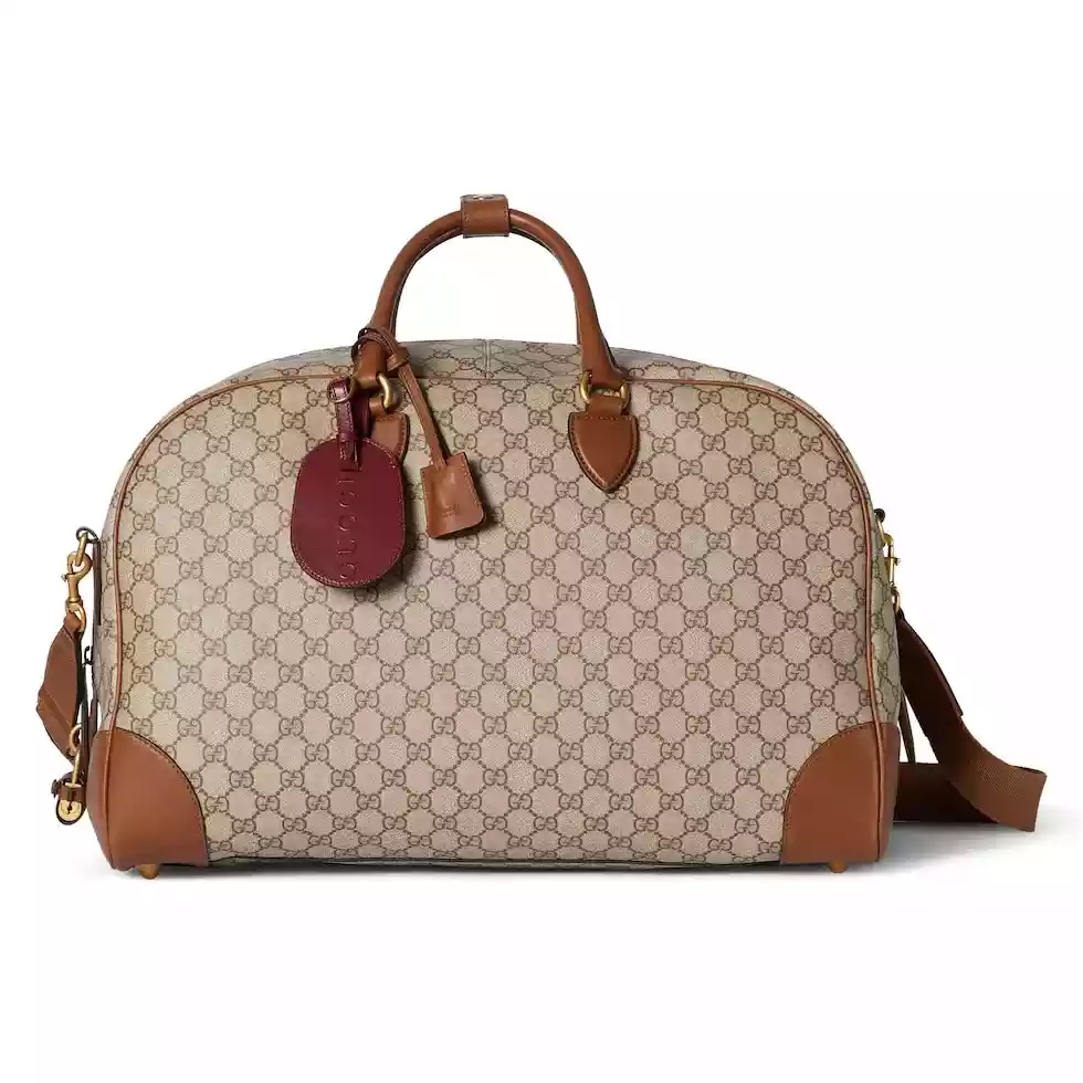 Gucci GG Canvas Medium leather-trimmed duffel bag – BG075