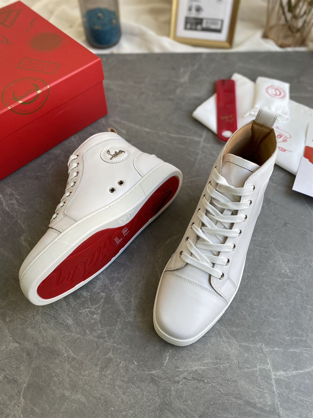 CHRISTIAN LOUBOUTIN HIGH TOP SNEAKER – CLS002