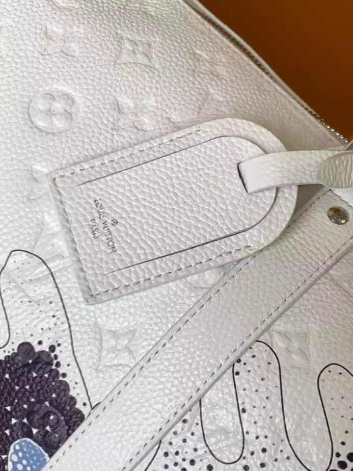 X YAYOI KUSAMA KEEPALL 50 TAURILLON MONOGRAM M21678 – LW368