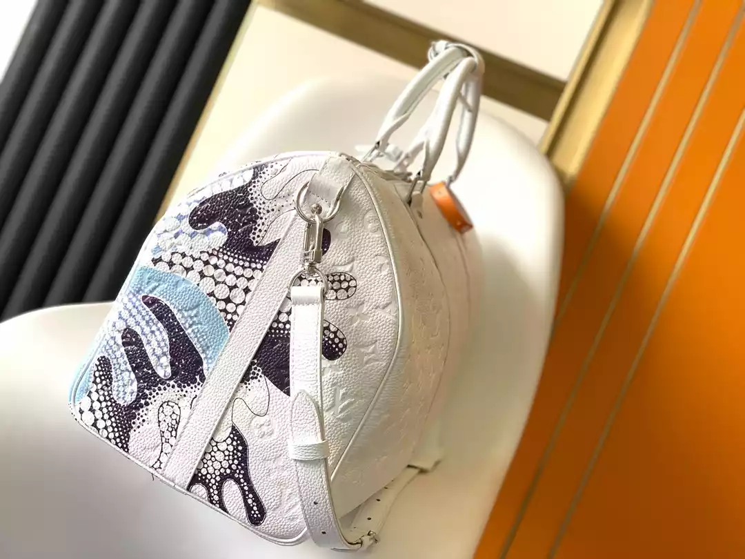 X YAYOI KUSAMA KEEPALL 50 TAURILLON MONOGRAM M21678 – LW368