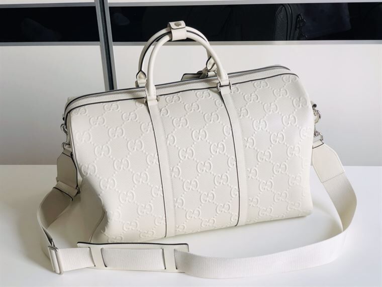 GUCCI GG EMBOSSED DUFFLE BAG – BG015