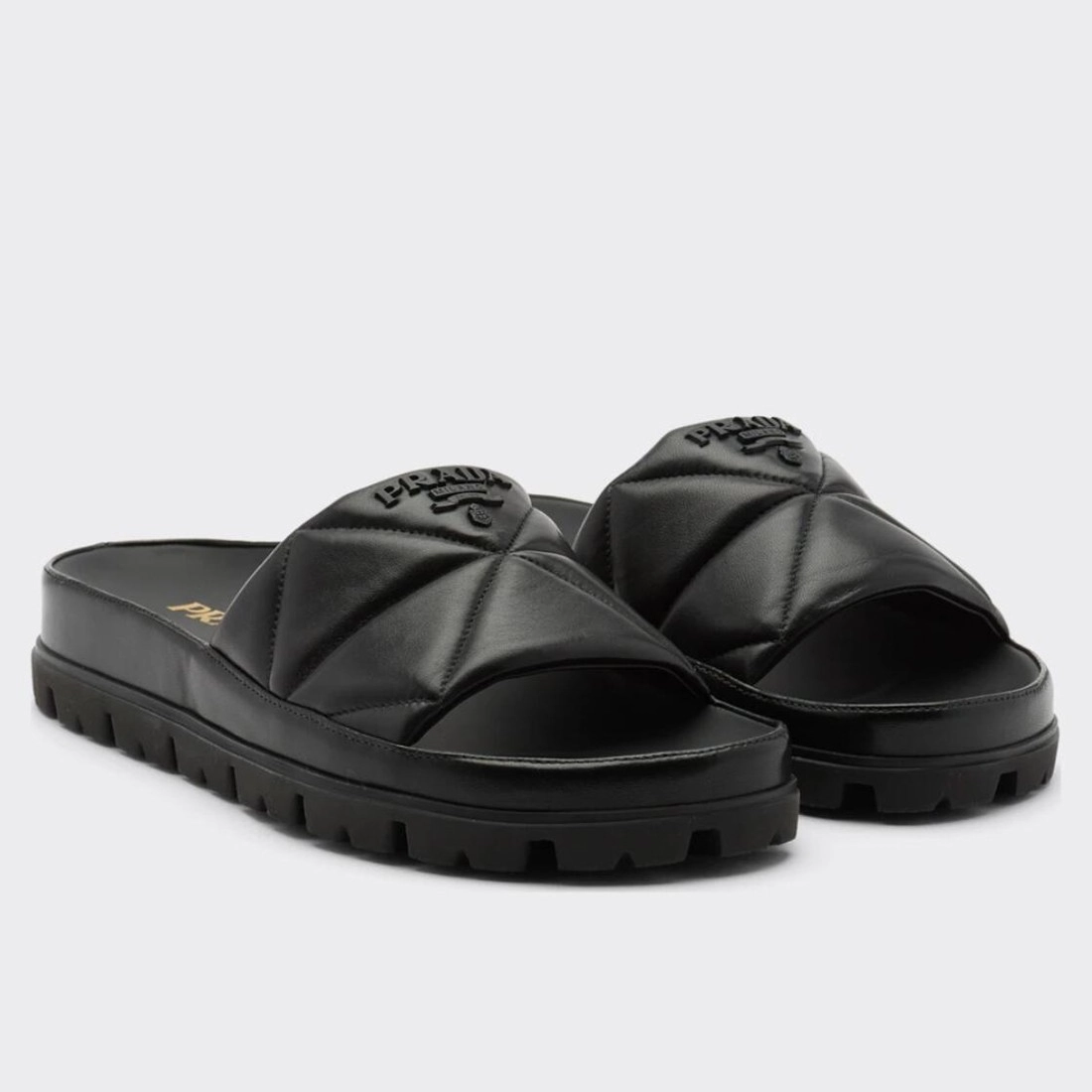 PRADA WOMEN’S SLIDES IN BLACK QUILTED NAPPA LEATHER – PSD083