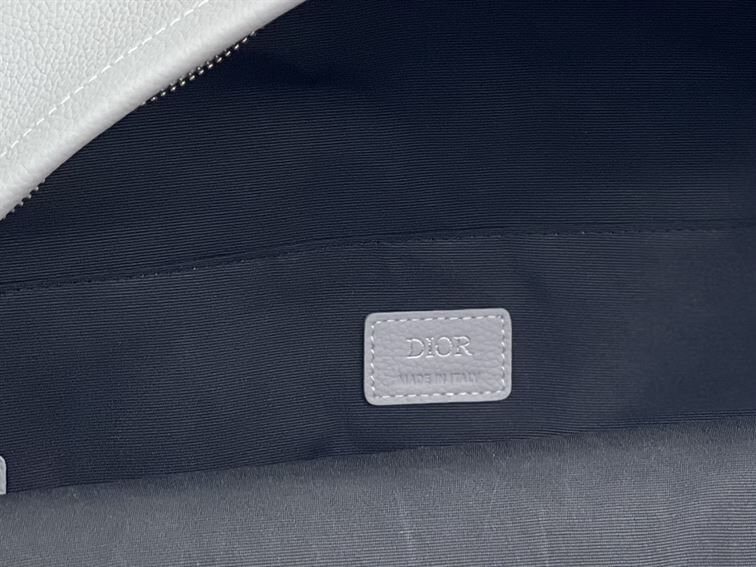 DIOR RIDER BACKPACK GRAY GRAINED CALFSKIN WTIH “CHRISTIAN DIOR 1947” SIGNATURE – DIO023