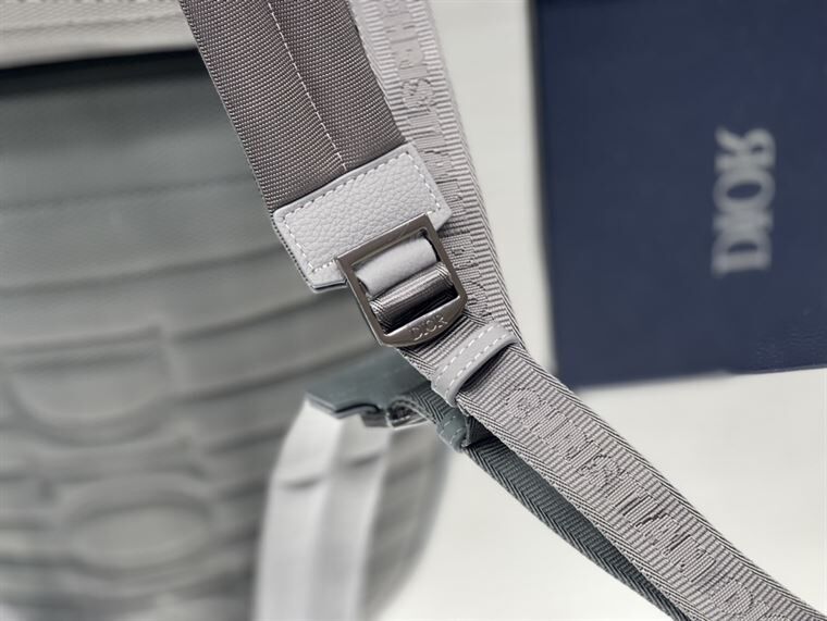 DIOR RIDER BACKPACK GRAY GRAINED CALFSKIN WTIH “CHRISTIAN DIOR 1947” SIGNATURE – DIO023