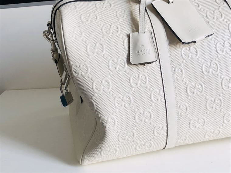 GUCCI GG EMBOSSED DUFFLE BAG – BG015