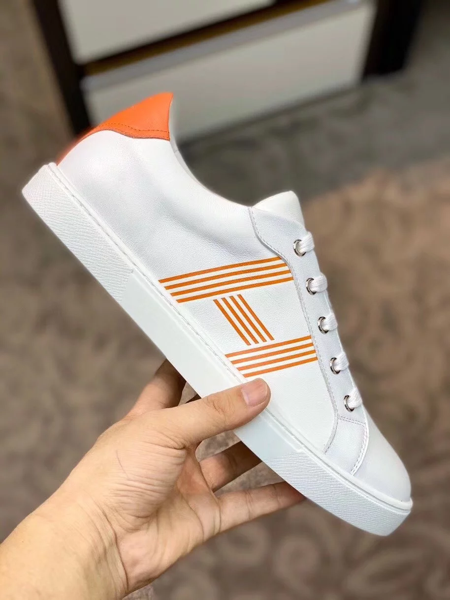 Hermes Men’s Avantage Sneakers In White/Orange Calfskin – HM061