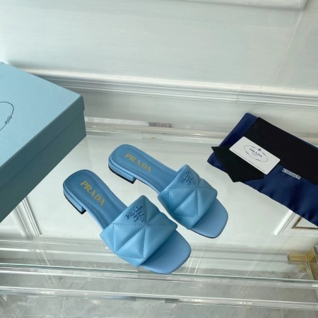 PRADA WOMEN’S SLIDES SANDALS IN LIGHT BLUE NAPPA LEATHER – PSD075