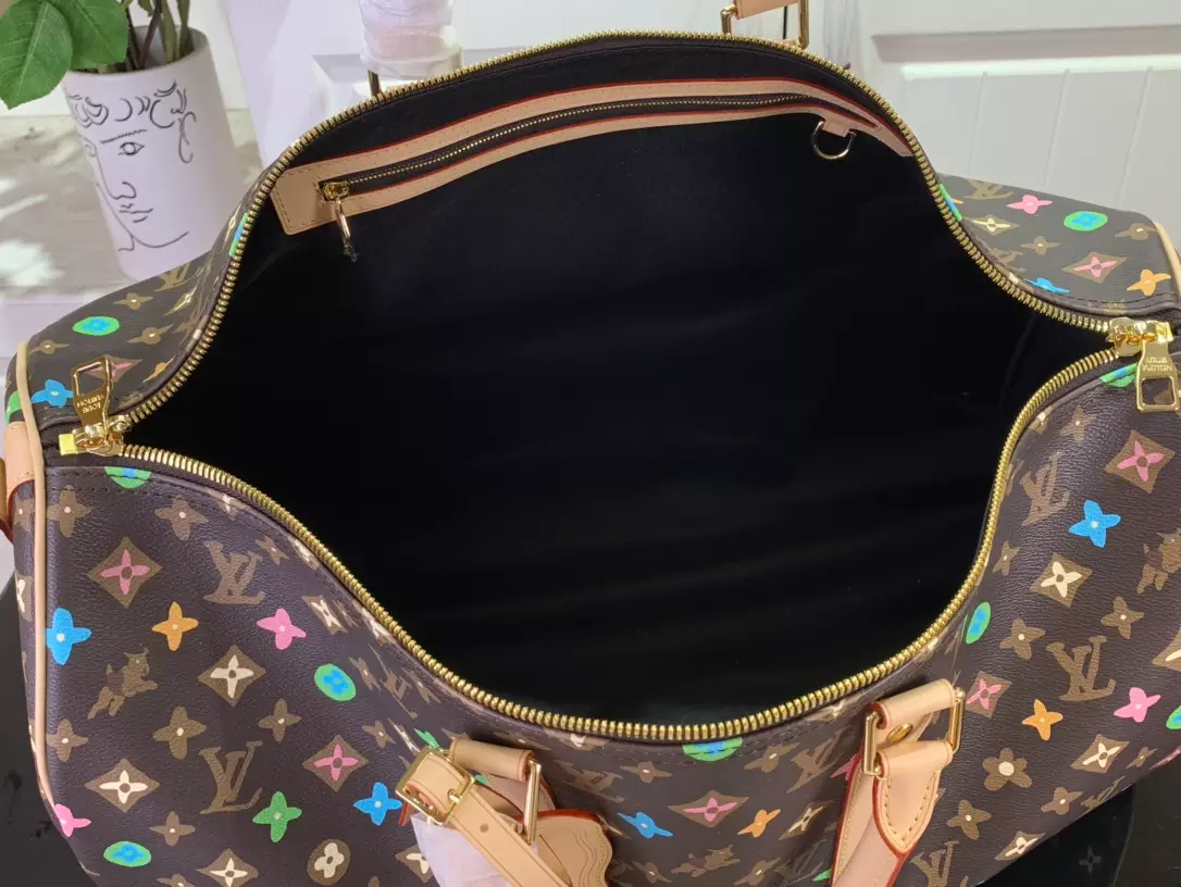 LV Keepall Bandoulière 50 Bag in Chocolate Monogram Craggy Coated Canvas – LW176