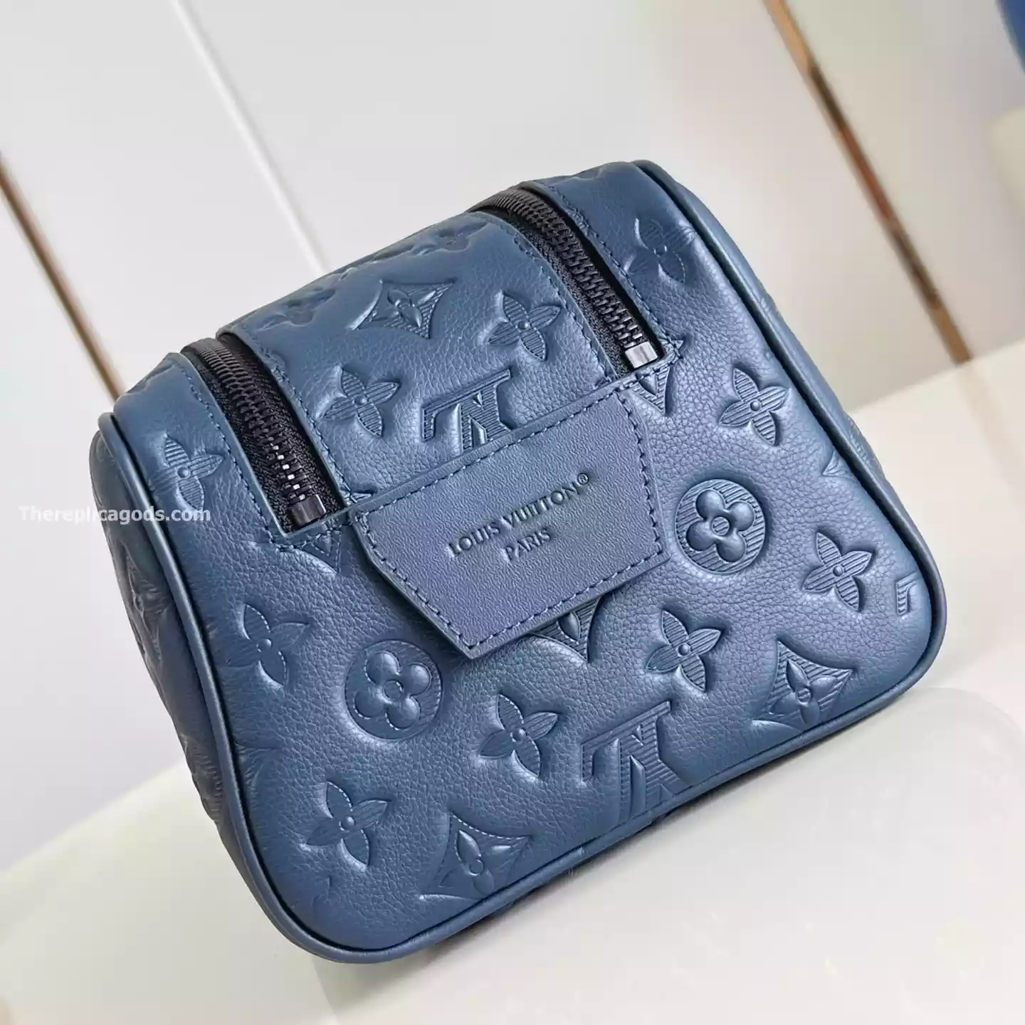 DOPP KIT NAVY BLUE MONOGRAM SHADOW – LW303