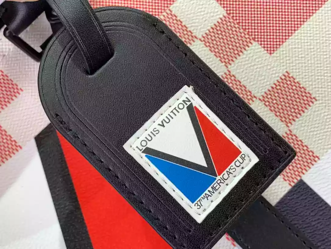 LV Keepall Bandoulière 50 in Redblue Damier Flag Coated Canvas – LW179