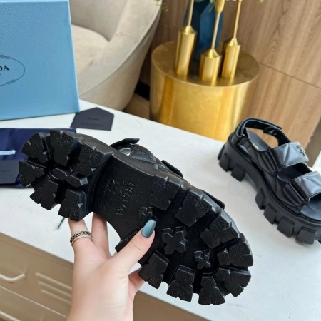 PRADA MONOLITH FLATFORM SANDALS IN BLACK NAPPA LEATHER – PSD019