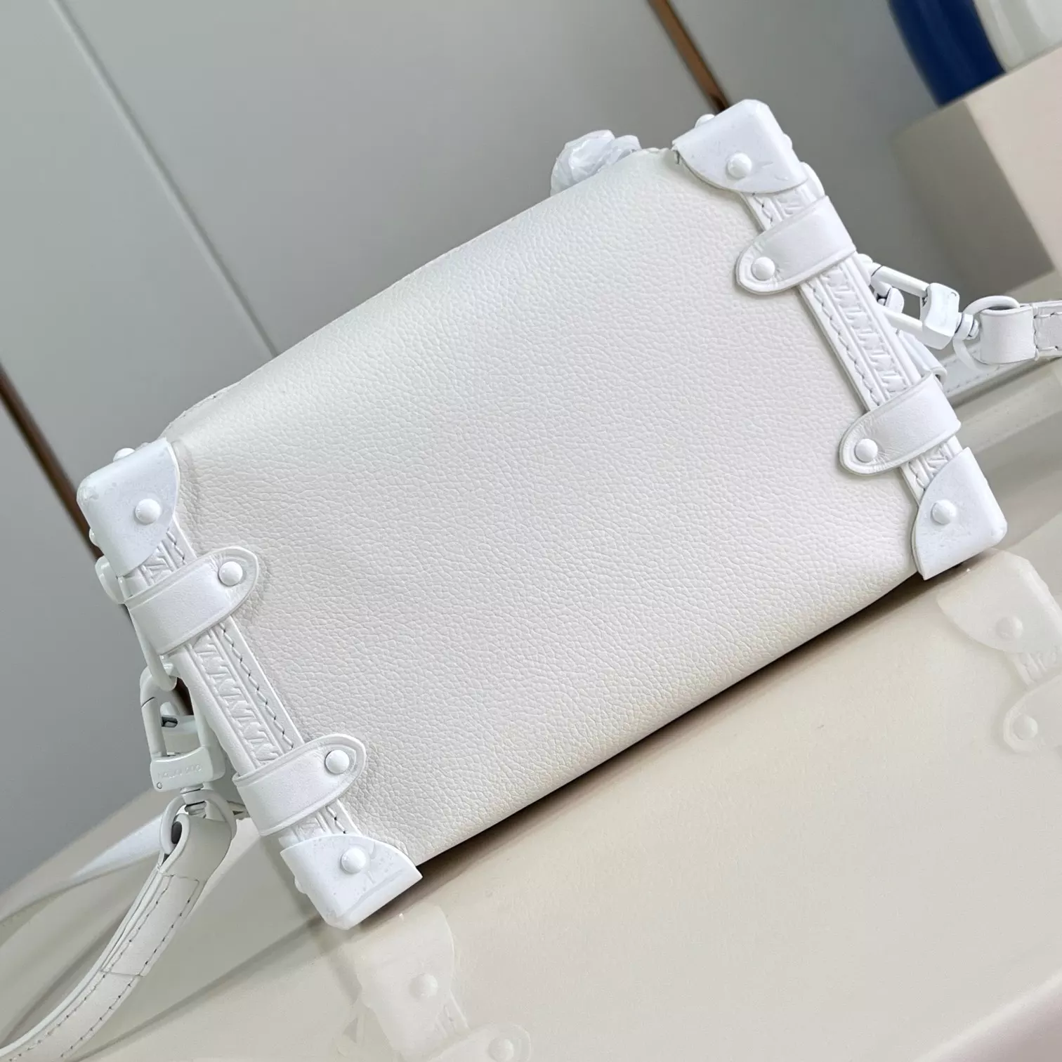 SIDE TRUNK PM BAG OPTICAL WHITE COWHIDE LEATHER M24304 – LW425