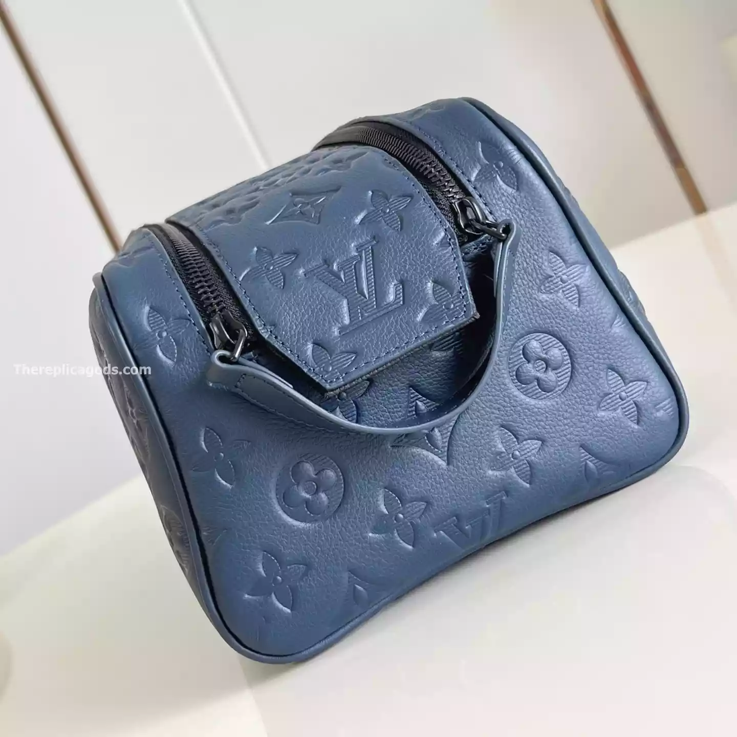 DOPP KIT NAVY BLUE MONOGRAM SHADOW – LW303
